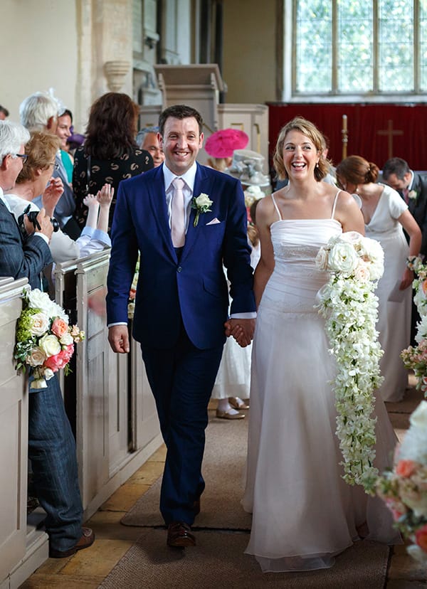 bride and groom leaving felbrigg church