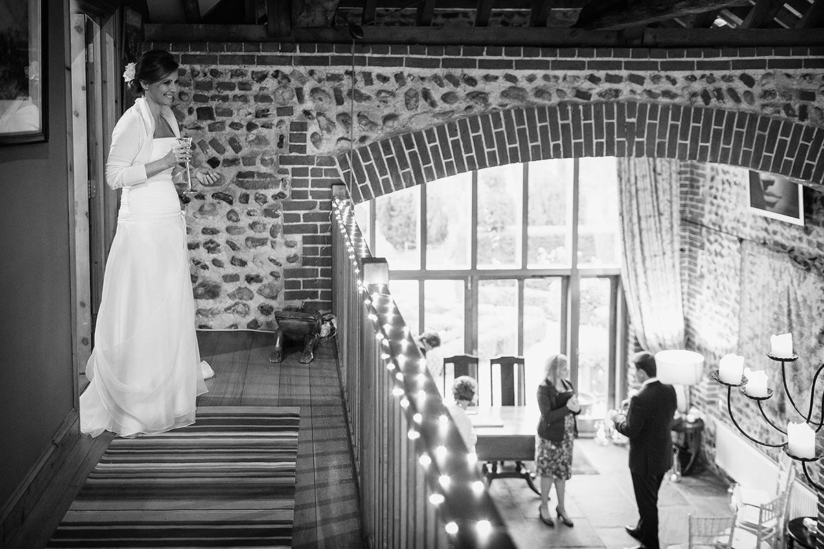 the groom talks to the registrar before the ceremony