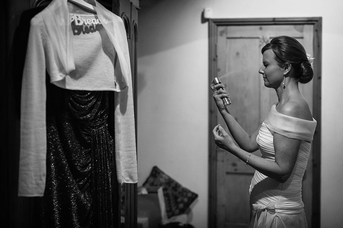 a final puff of perfume for the bride