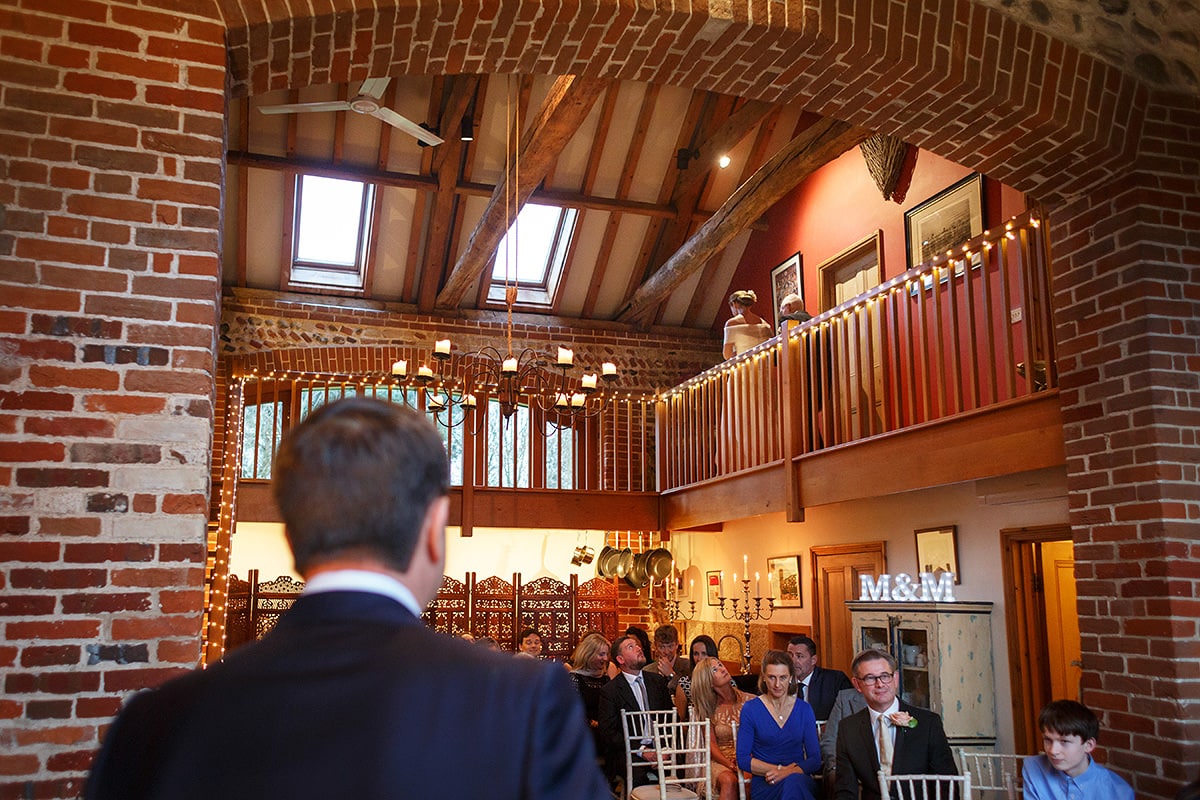 the groom waits before the ceremony