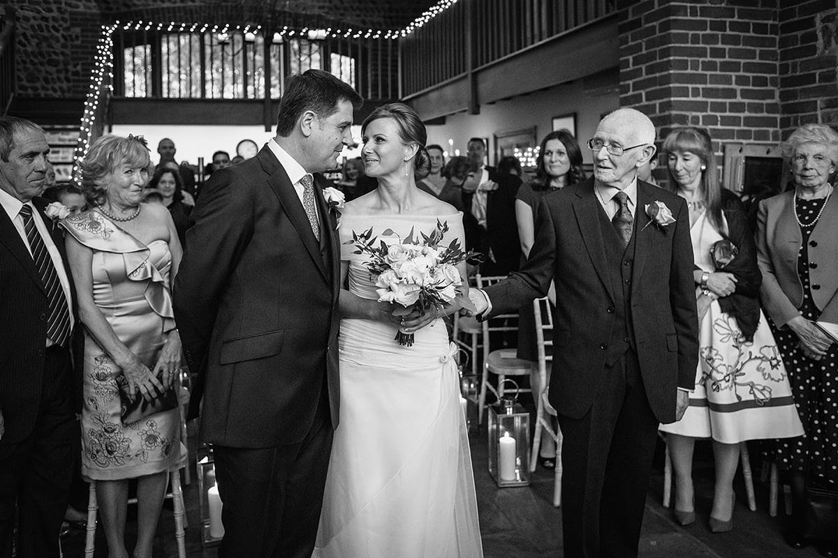 the groom greets the bride 