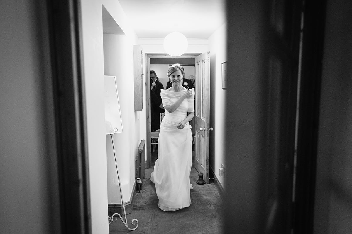 the bride walks through chaucer barn