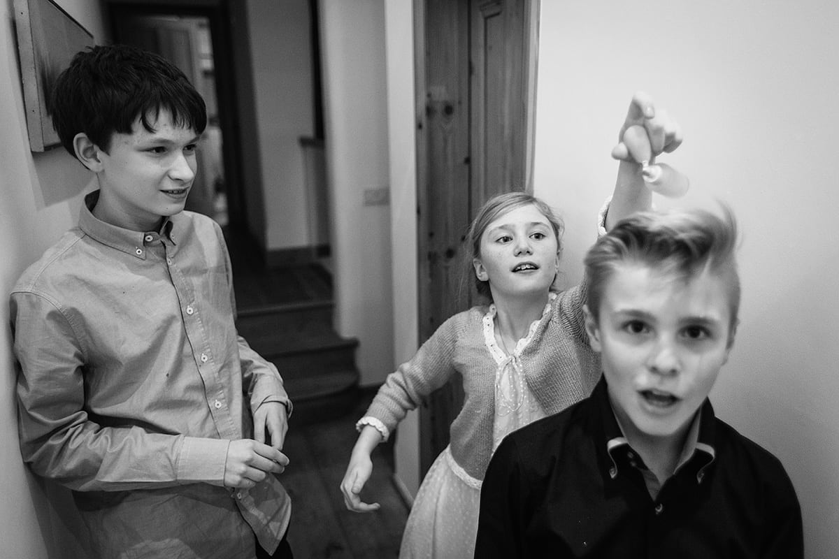 children play upstairs at the wedding