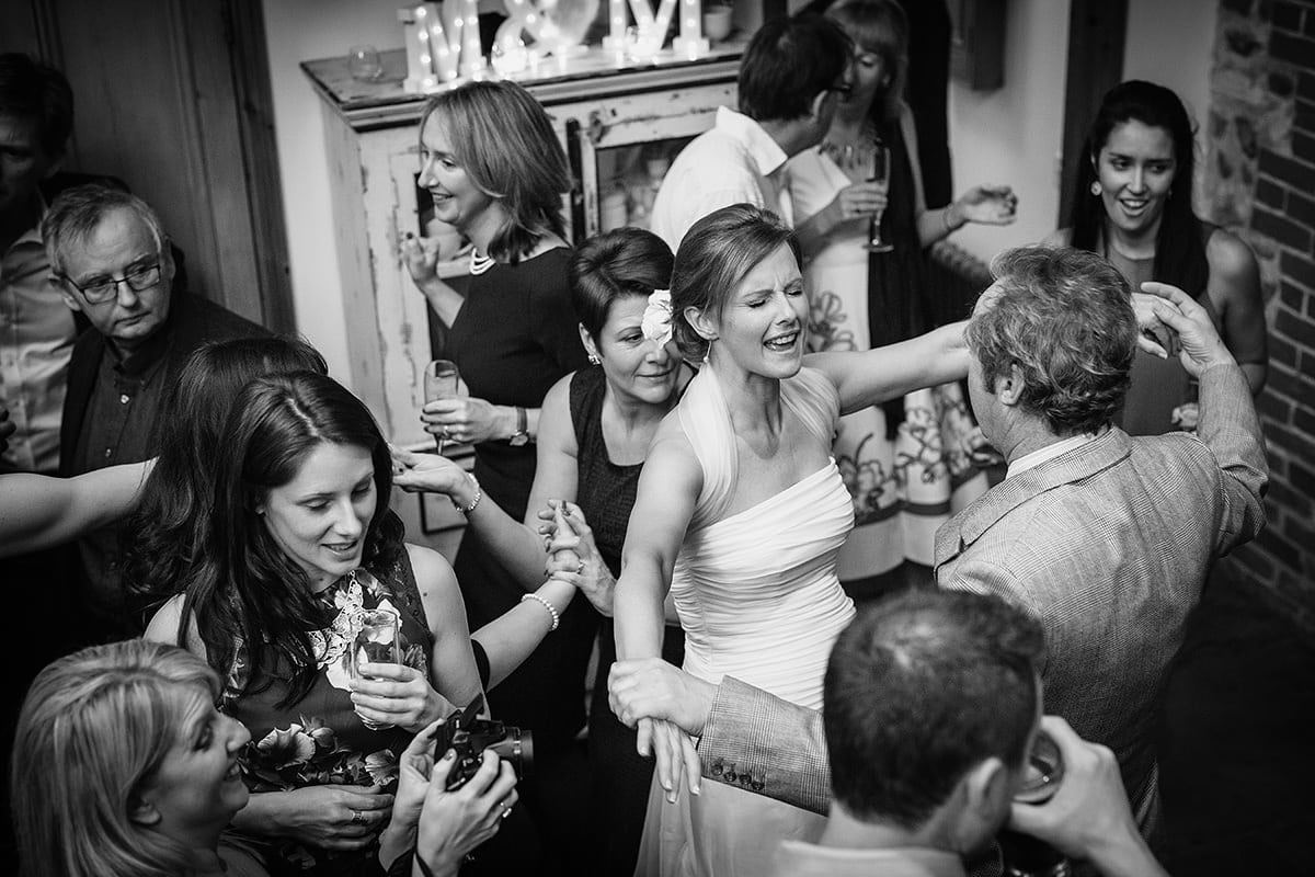 the bride dances with her friends