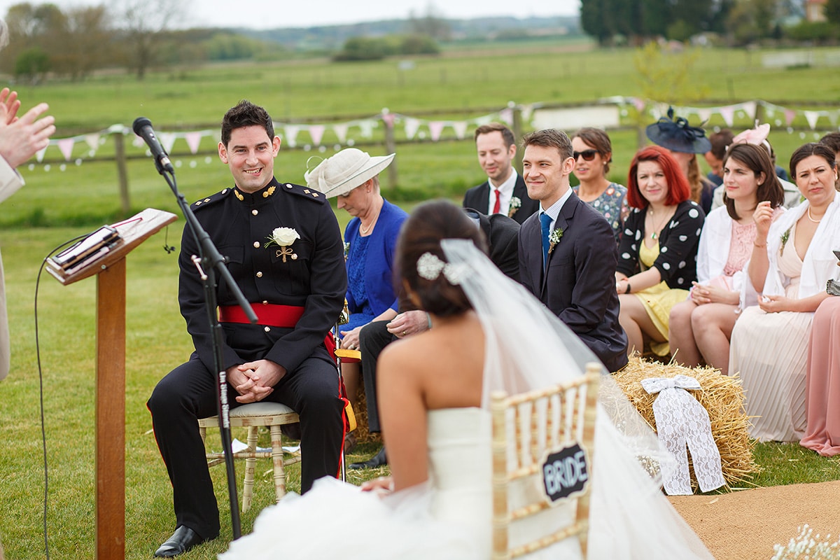 a nervous look on the grooms face at the start of the ceremony