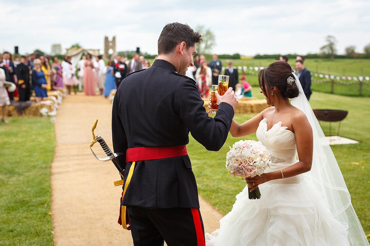 bride and groom toast their guests