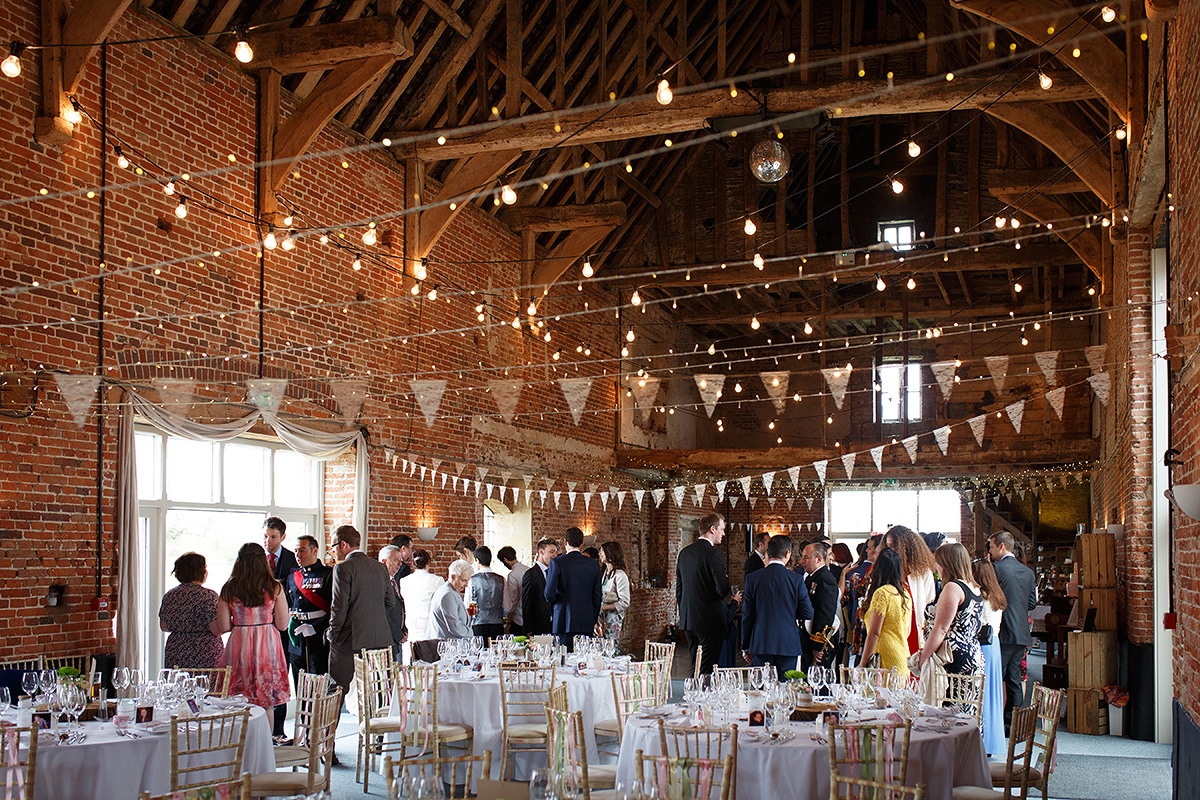 rob talks to guests inside godwick barn