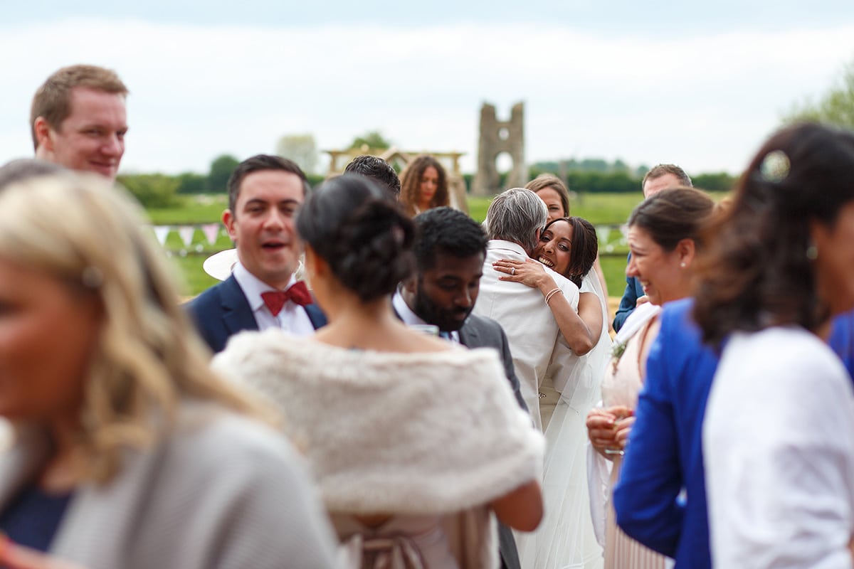 sam embracing her guests at the drinks reception