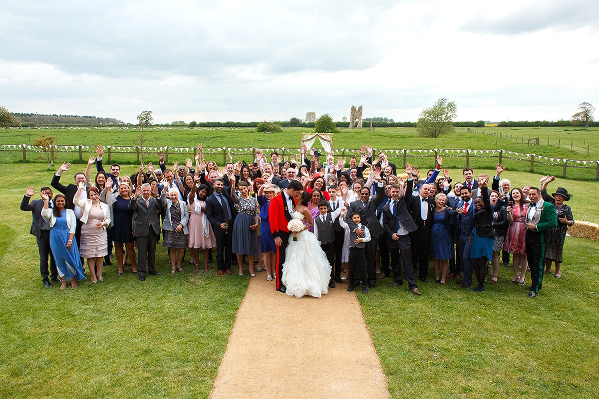 a group photo of everyone at a godwick barn wedding