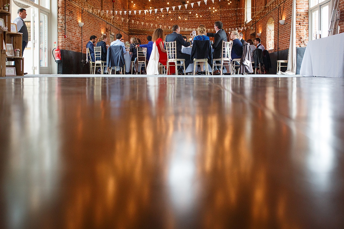 a reflection of godwick barn in the floor