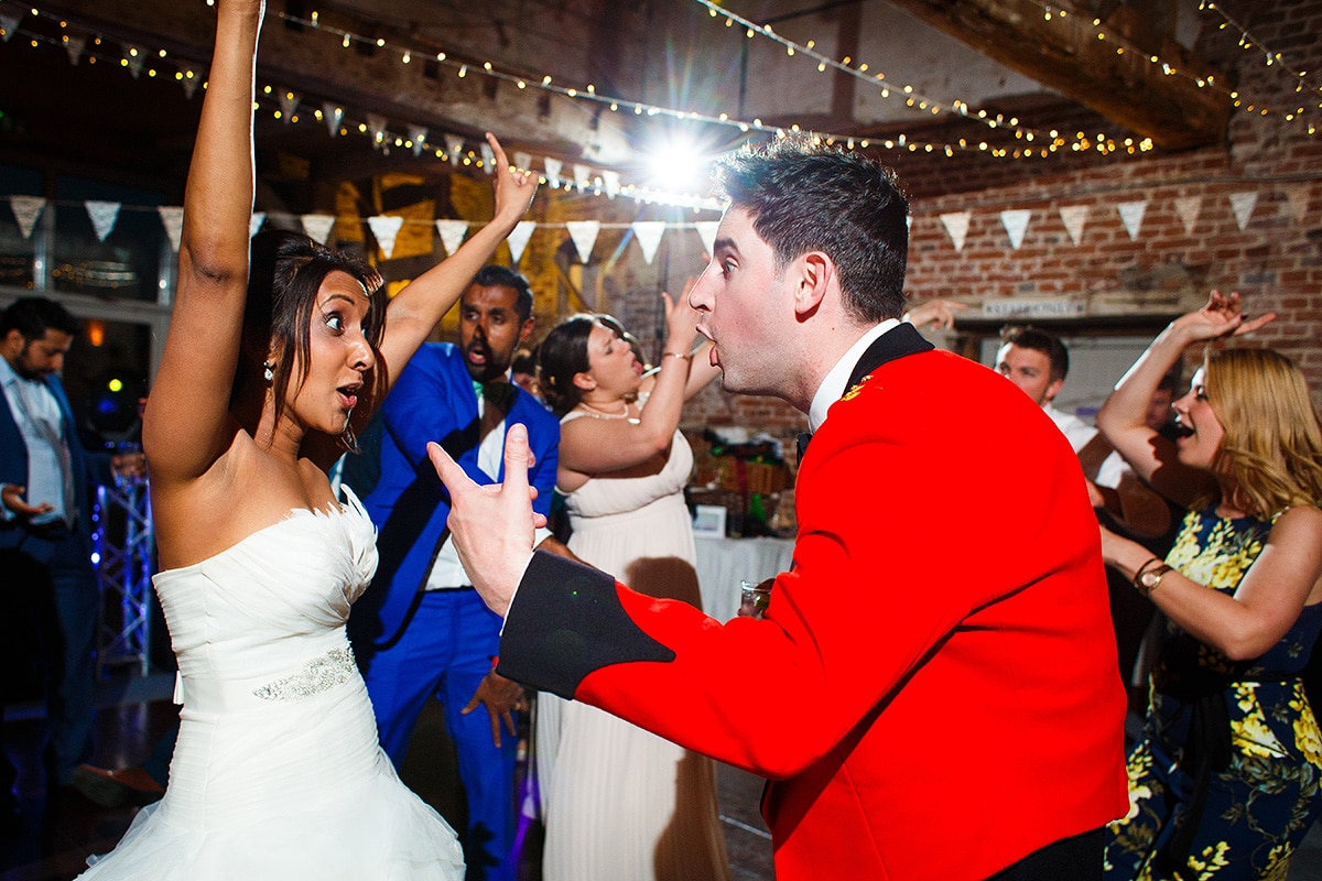 the bride and groom on the dancefloor