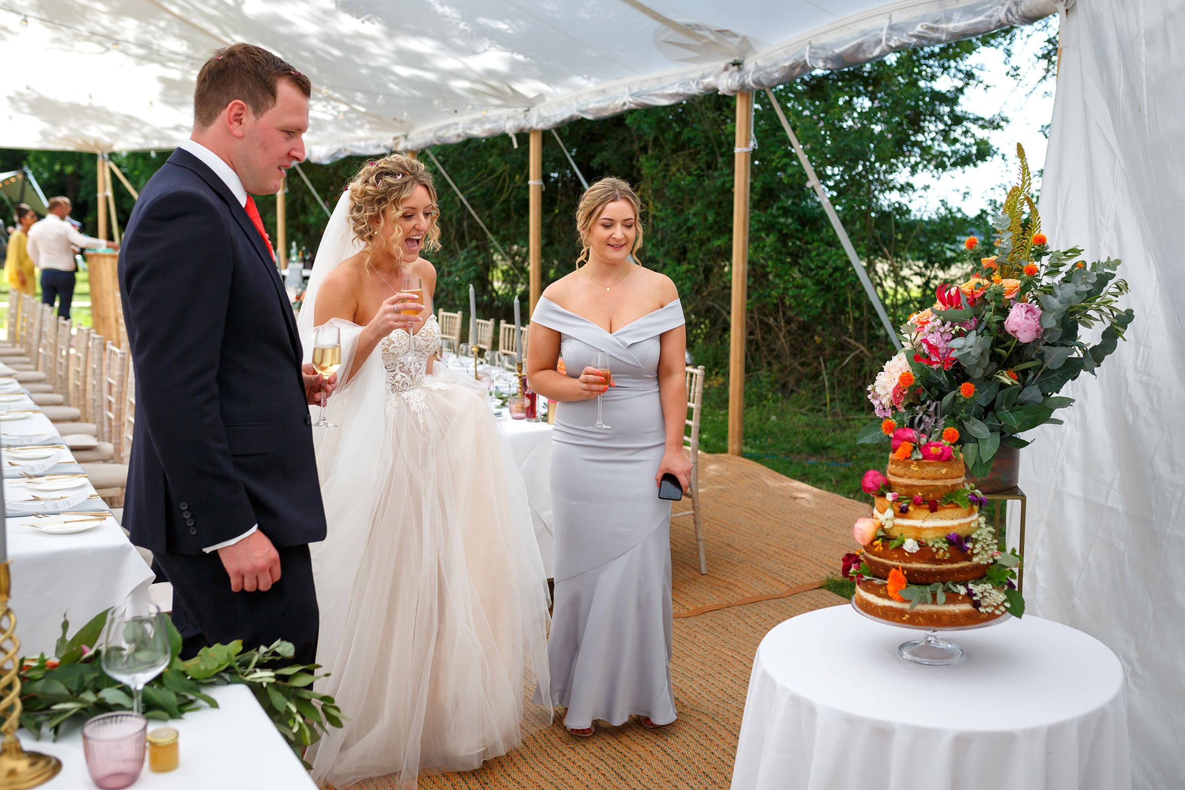 polly and steve check their wedding cake