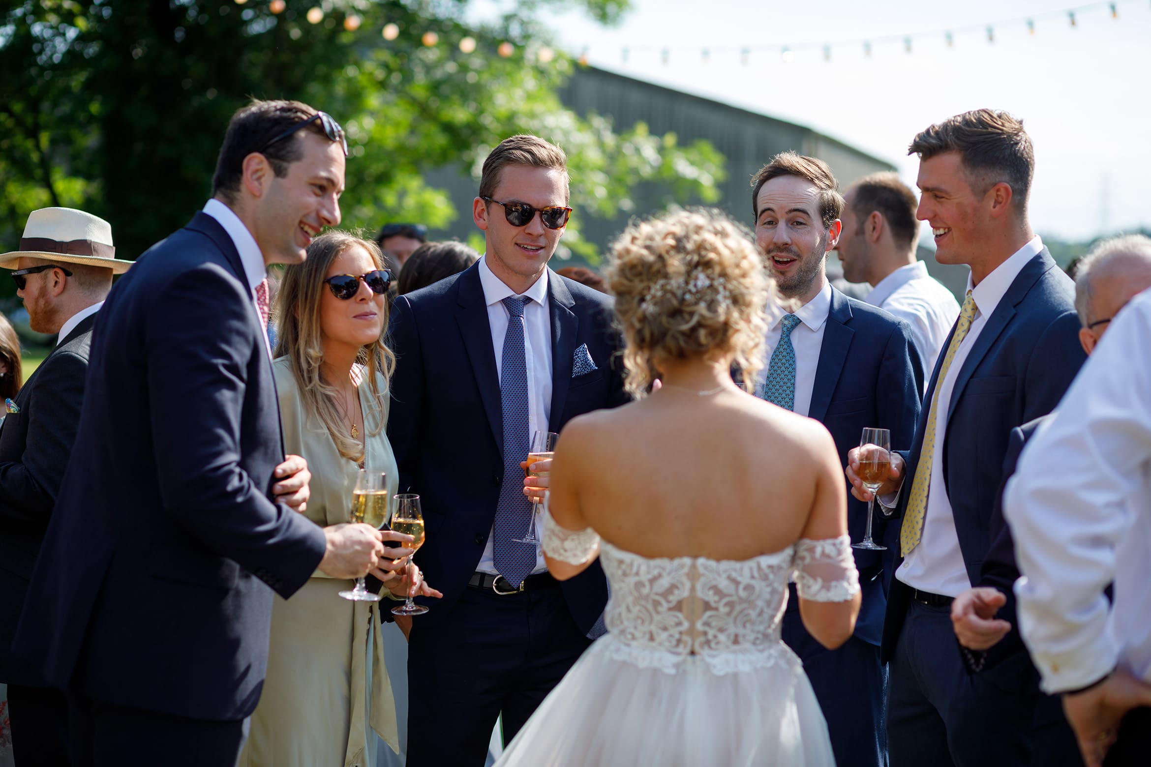 the bride talks to her guests