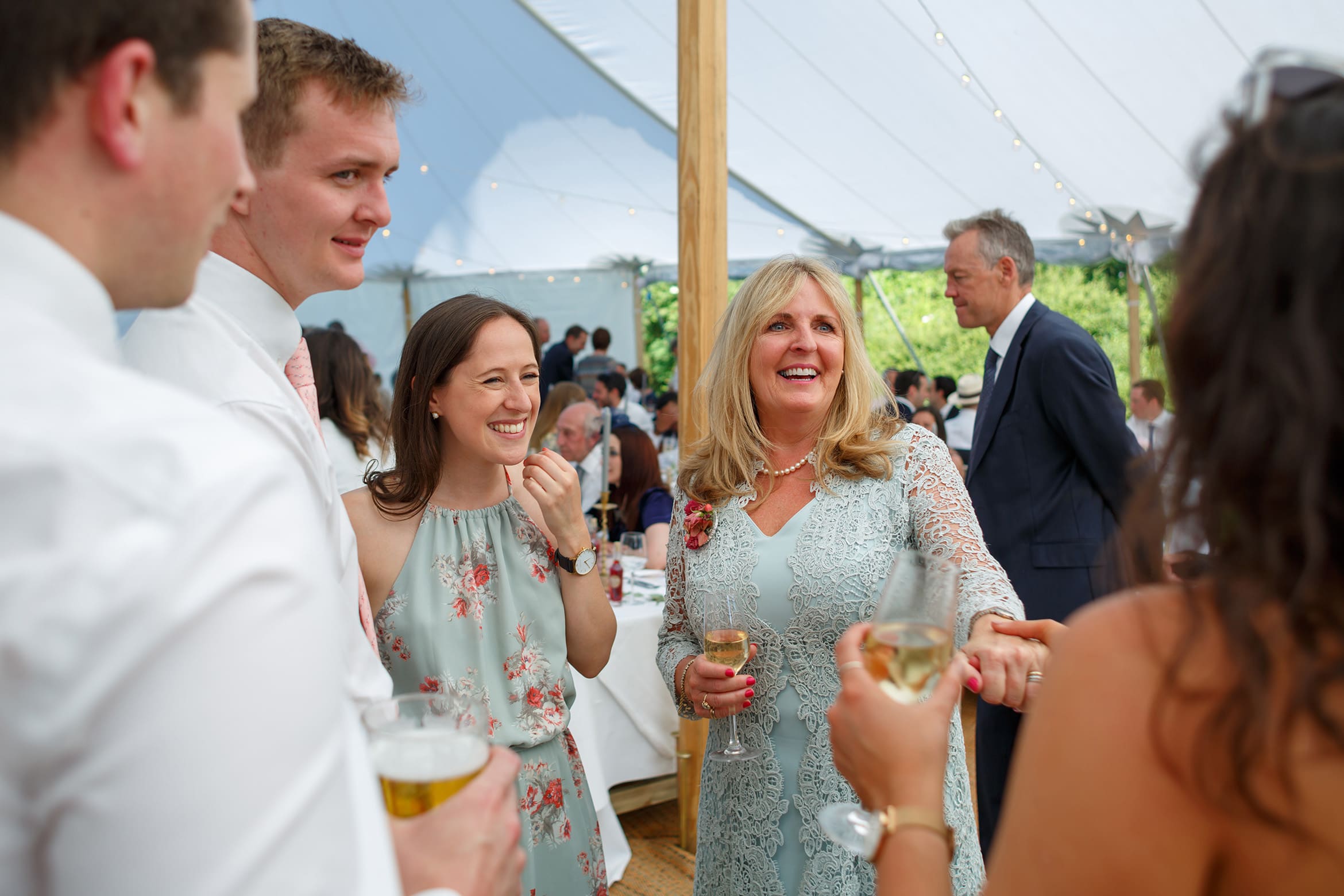 the grooms mother chatting with guests