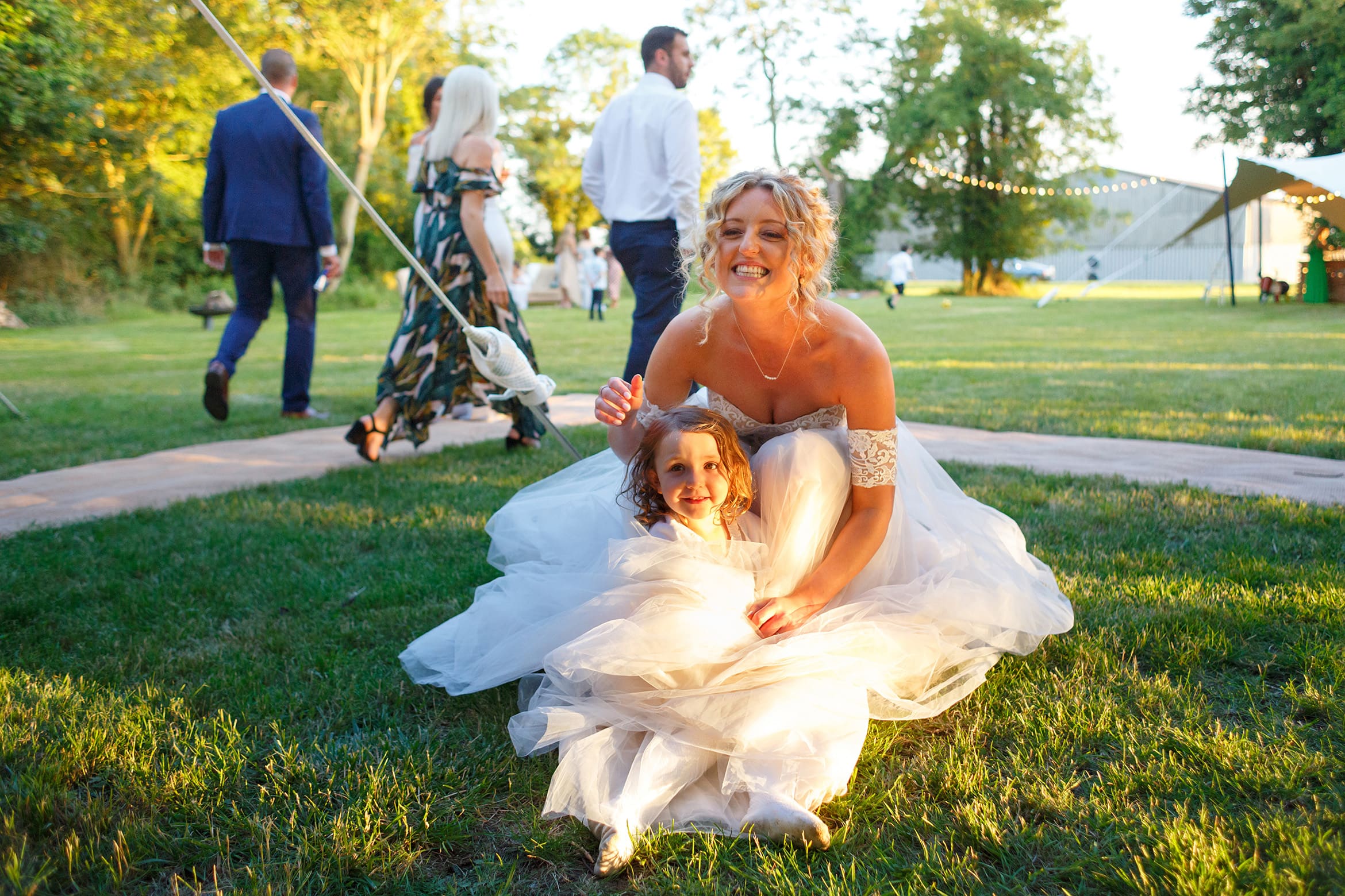 the bride and child in the sunlight