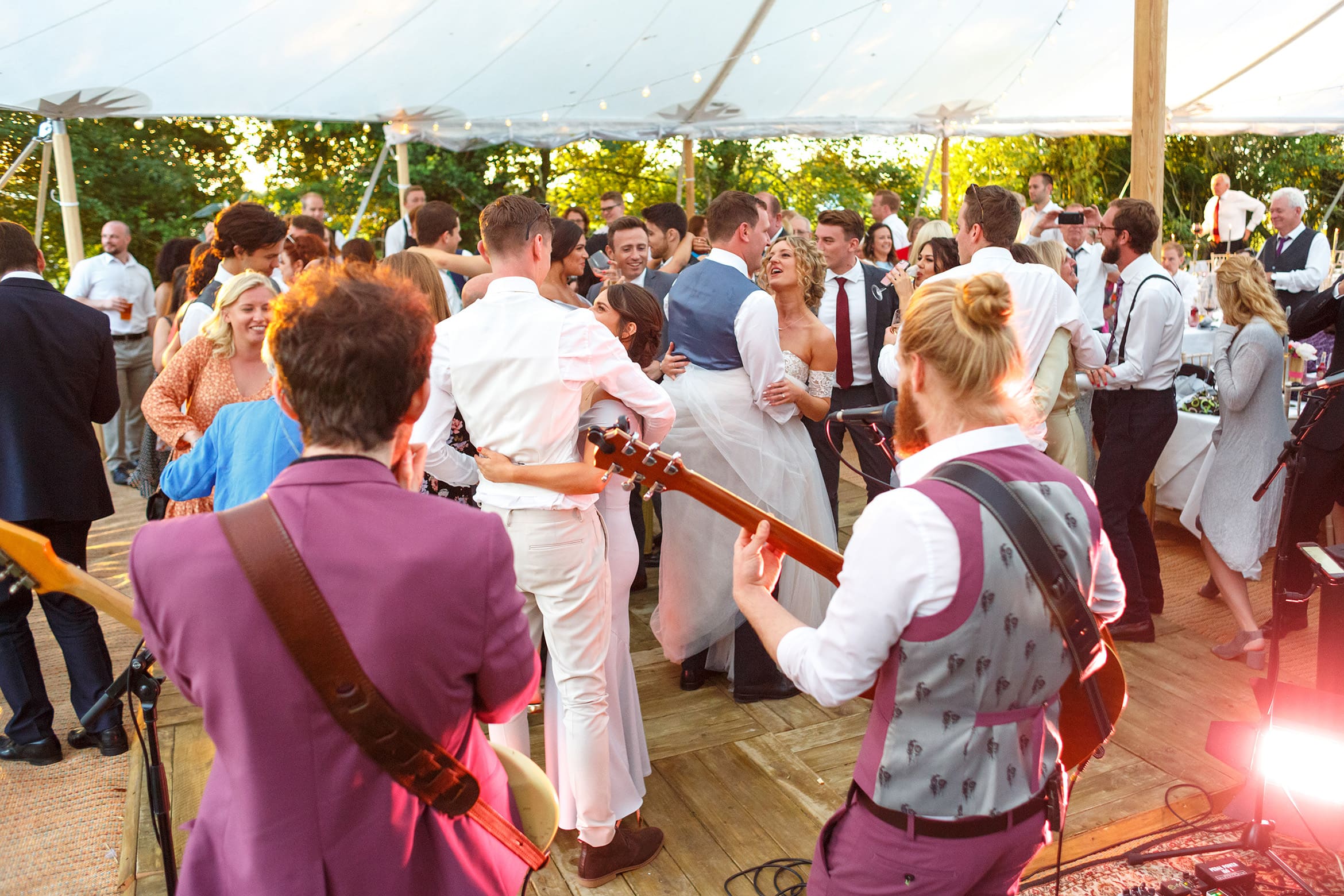 the guests join the couple on the dancefloor