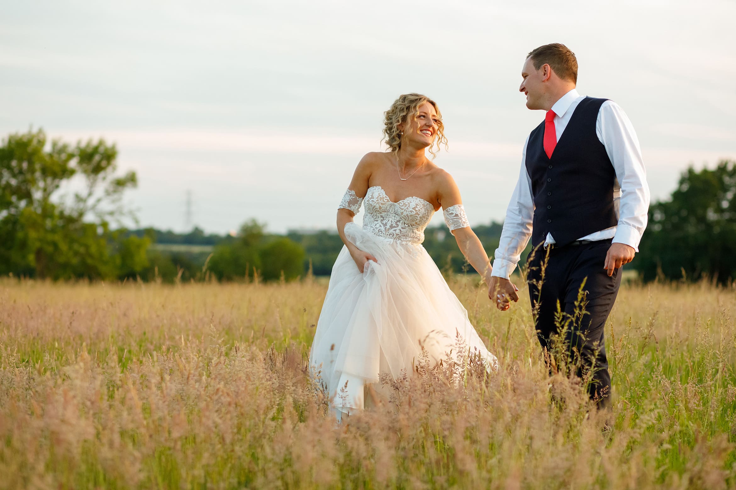 wedding portraits in a field