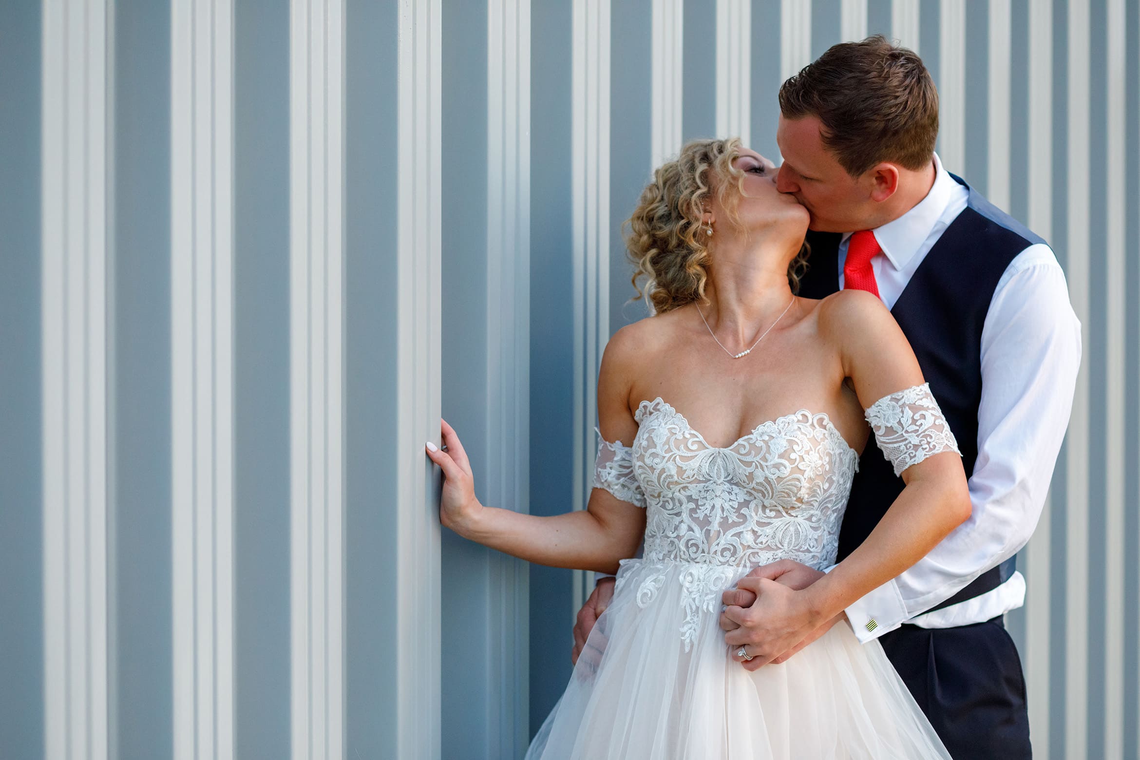 bride and groom kiss