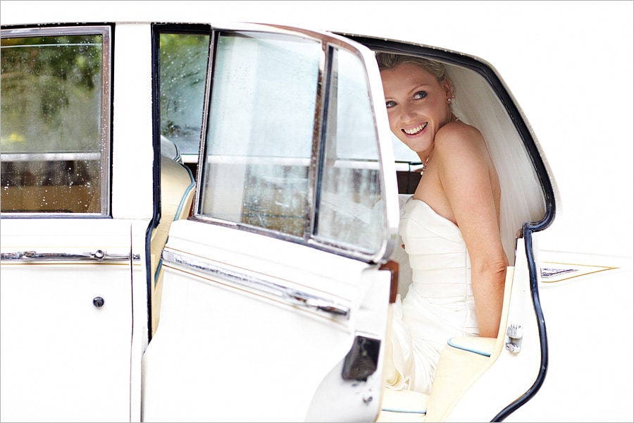 bride in the wedding car