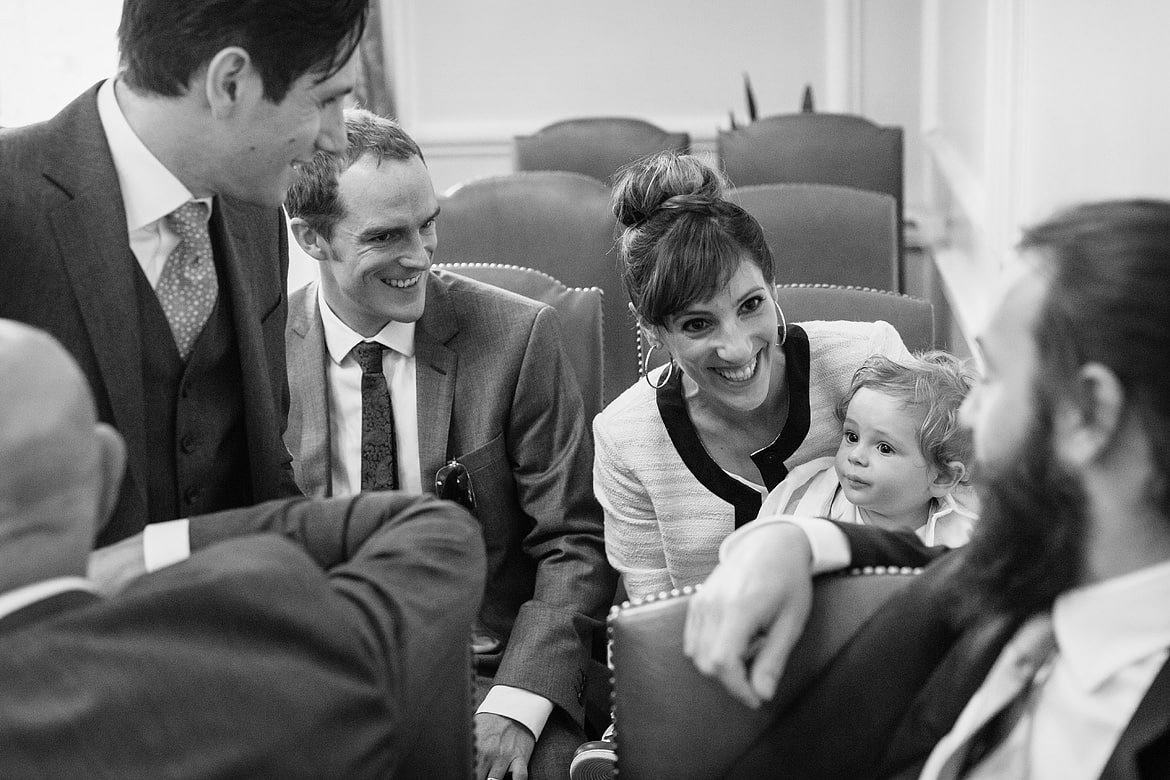 the grooms sister laughing with the groom