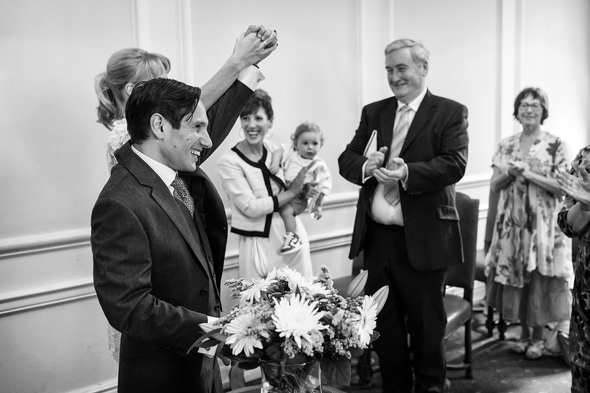 a happy bride and groom at marylebone town hall