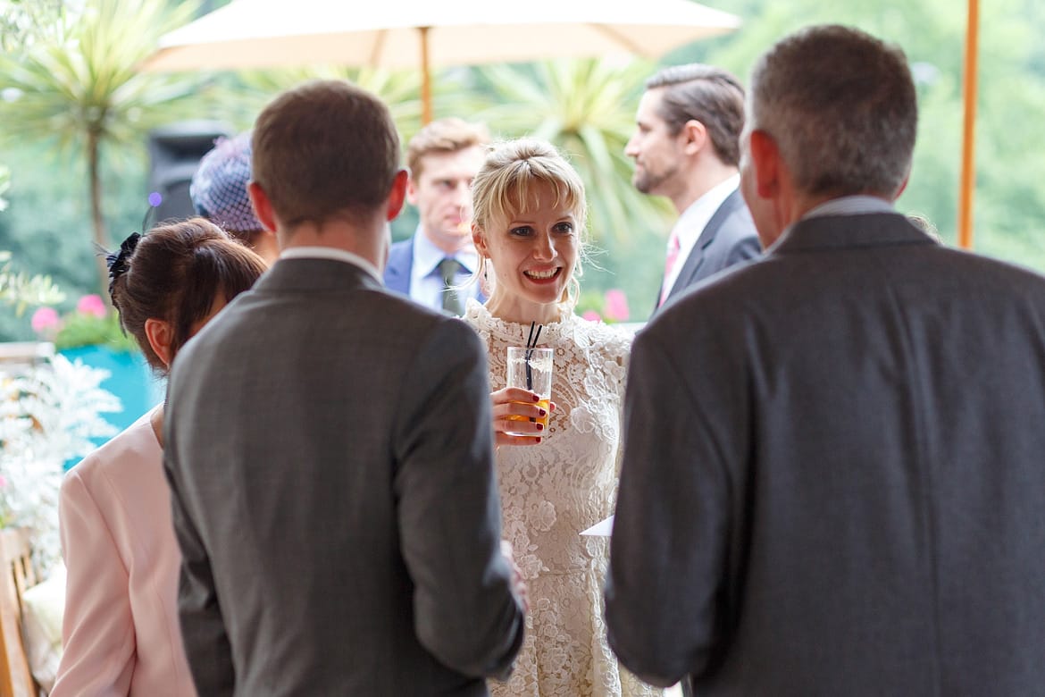 the bride talks to her guests