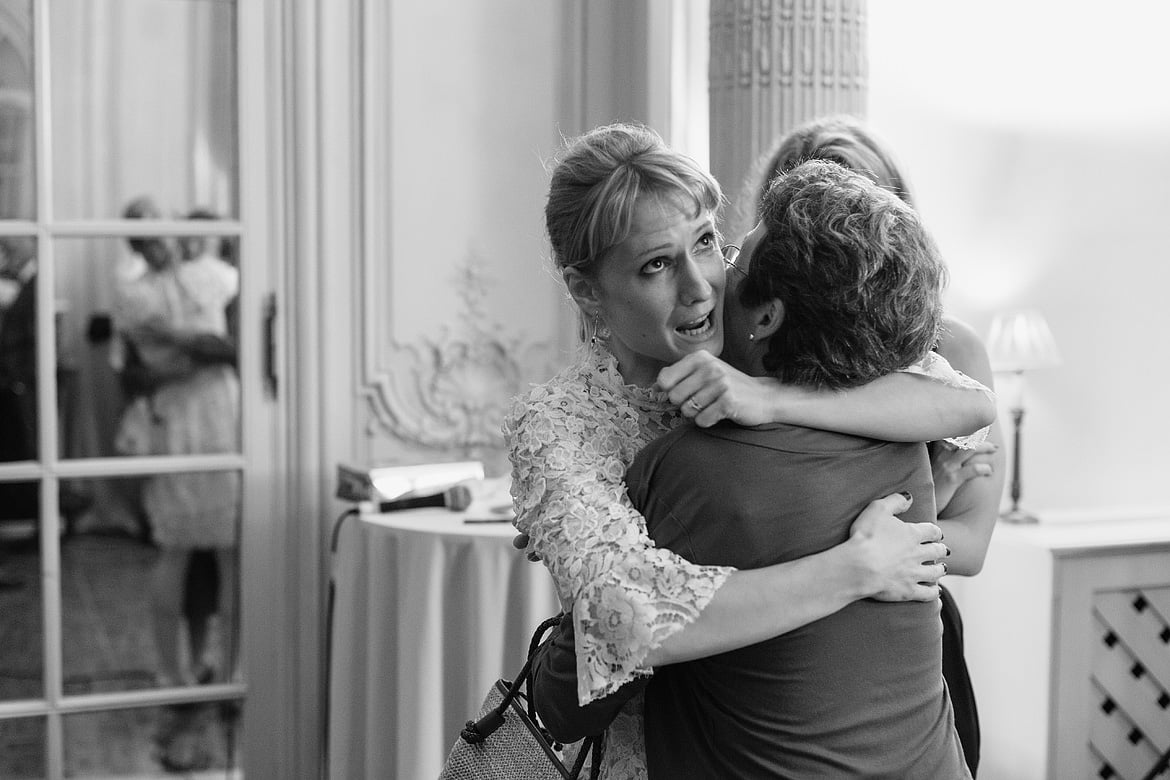 the bride hugs her friends