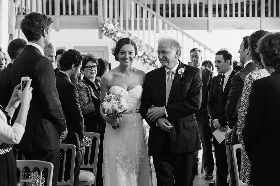 bride and father walking down the aisle