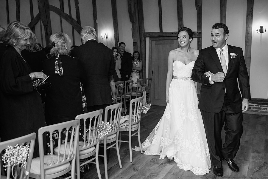 bride and groom leave the ceremony