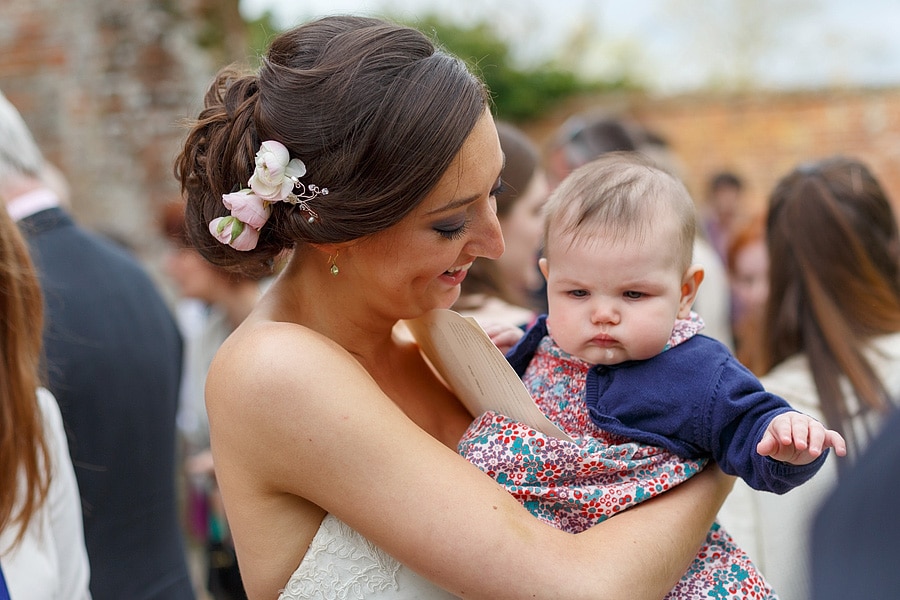 the bride and a grumpy baby