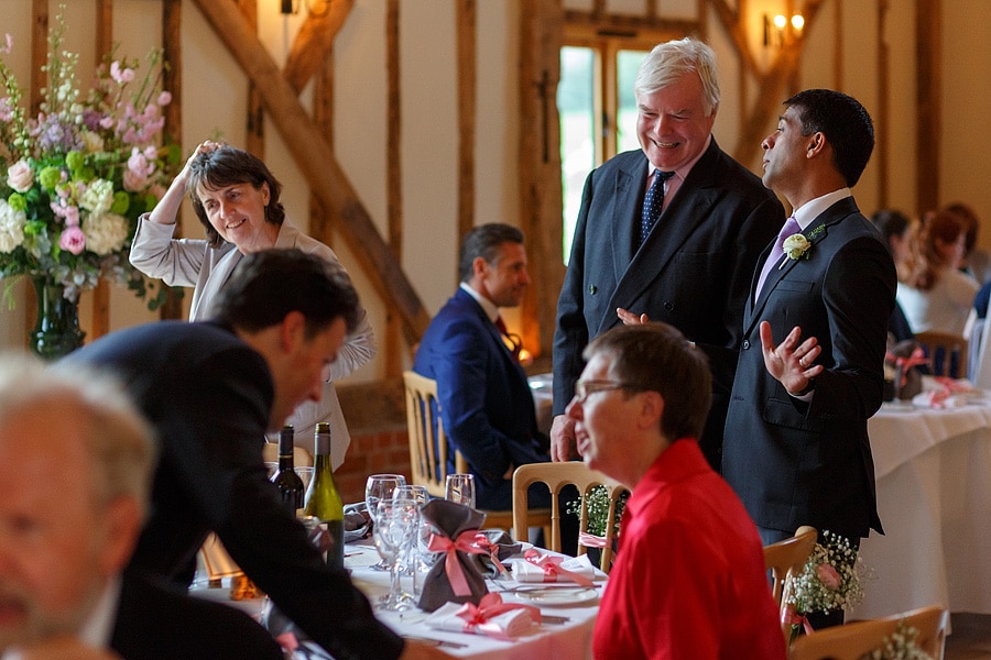 guests chat before the wedding breakfast