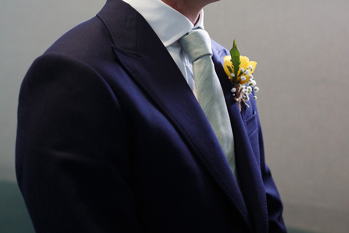 details of the grooms buttonhole