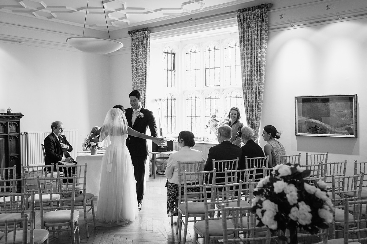 bride and groom in the ceremony room at the castle