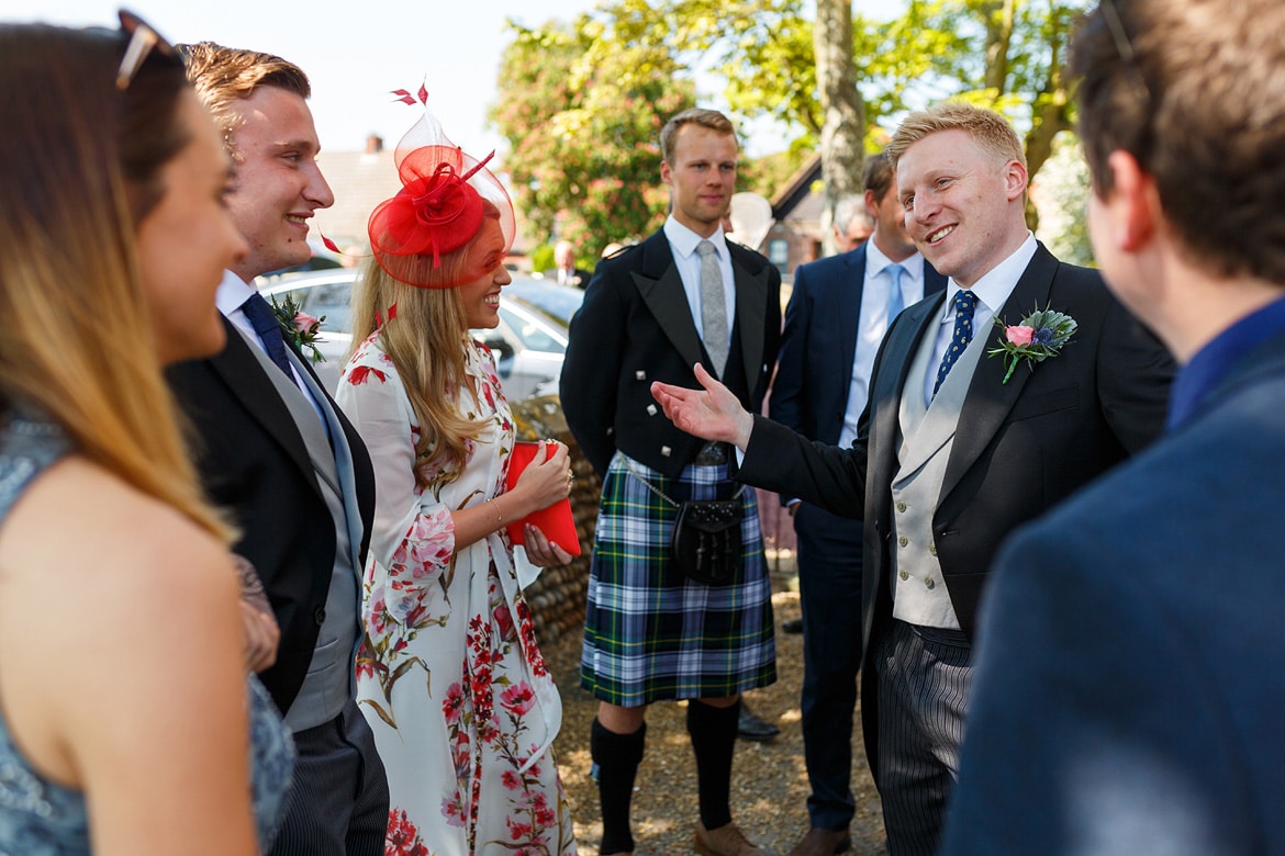 rory greets his guests outside aldeburgh church