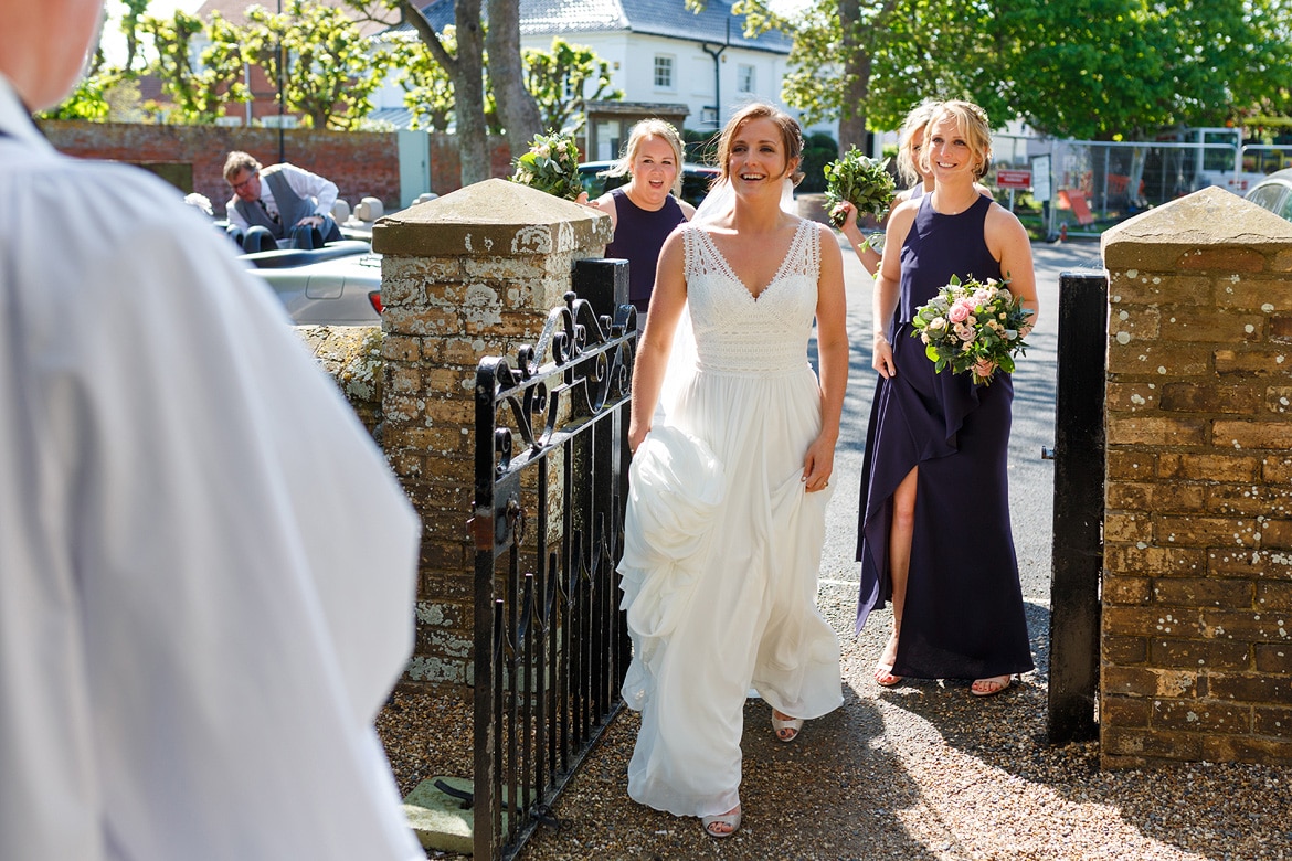 sophie and the bridesmaids outside aldeburgh church