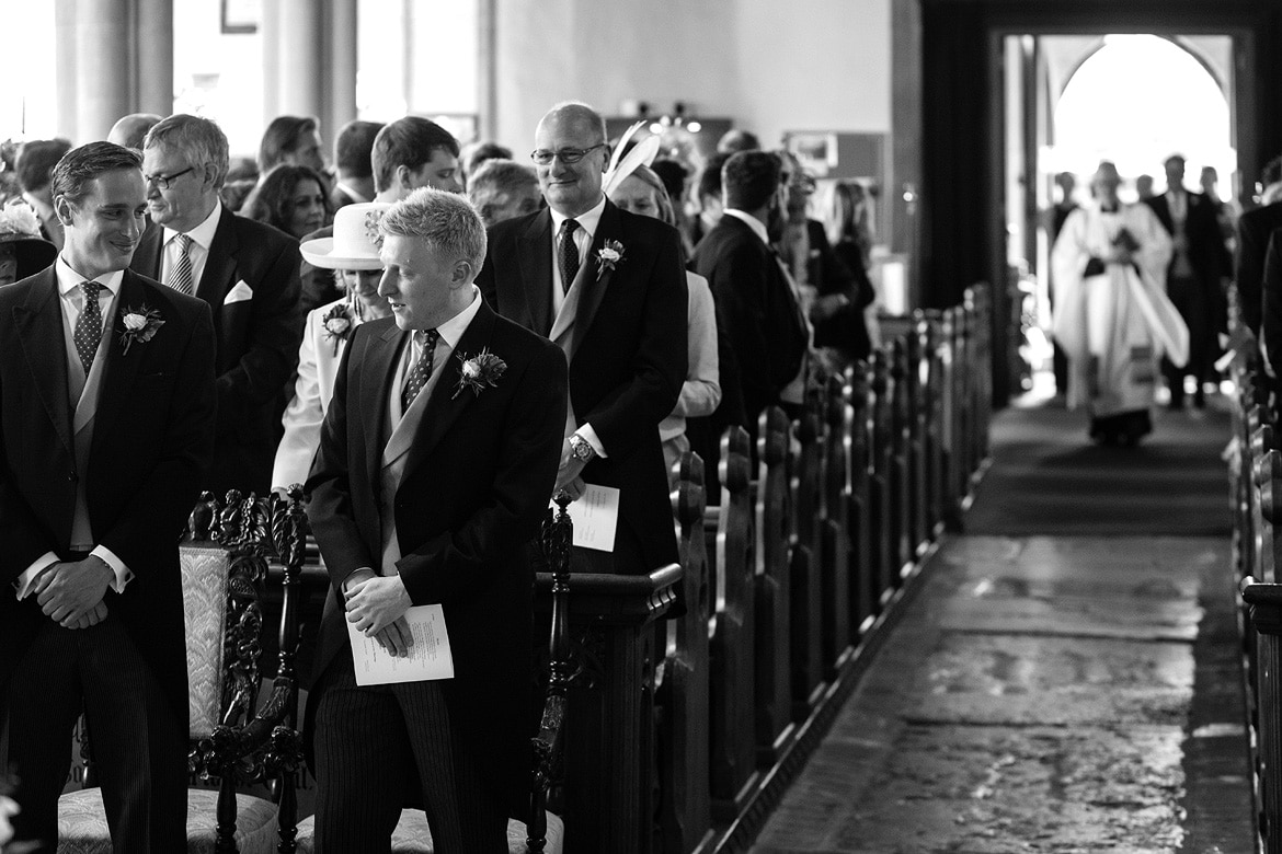 the groom waits in aldeburgh church with his best men