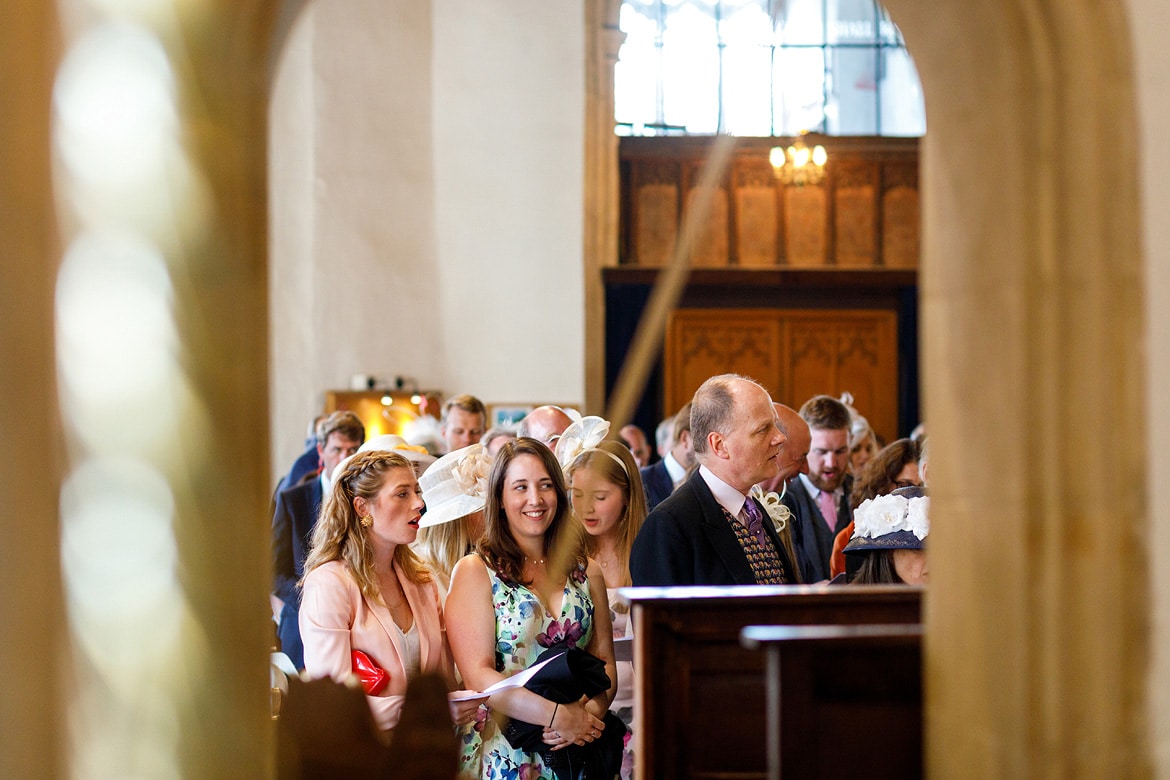 weddding guests inside aldeburgh church