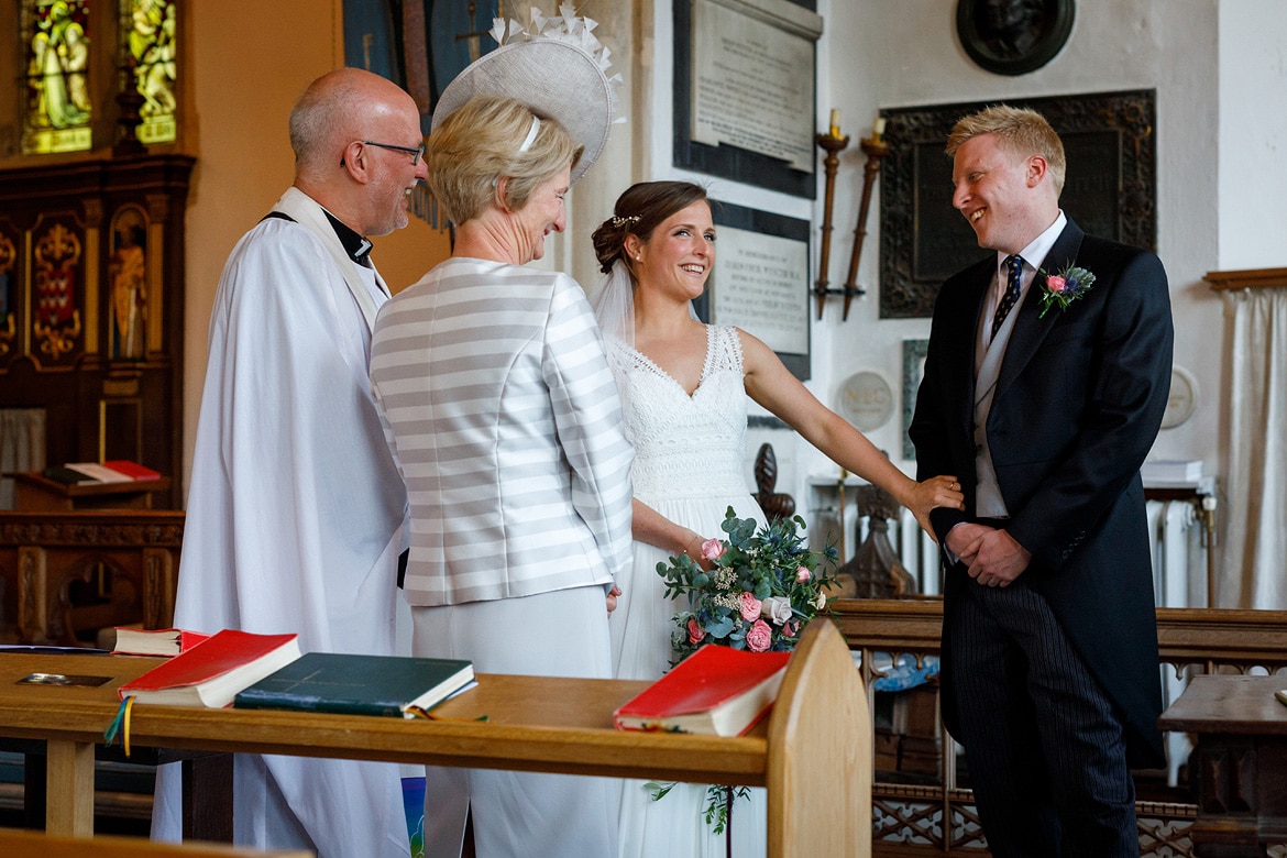 the couple sign the register