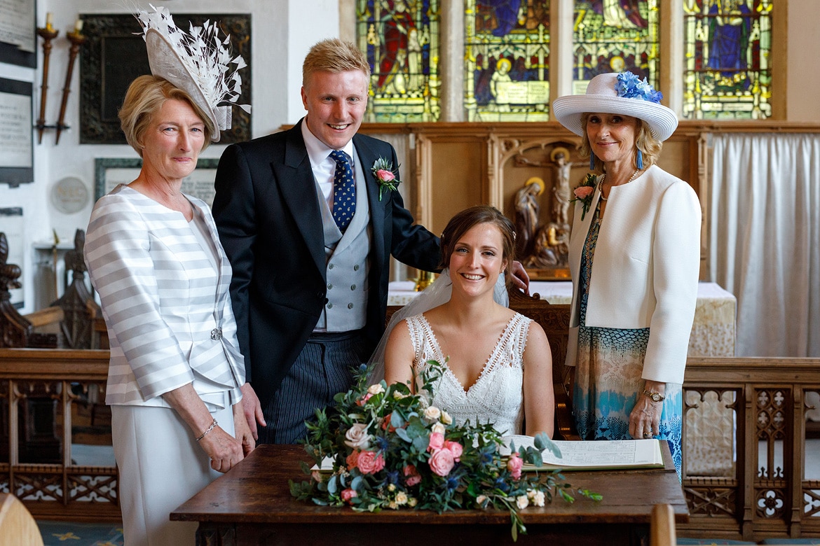 the couple sign the register