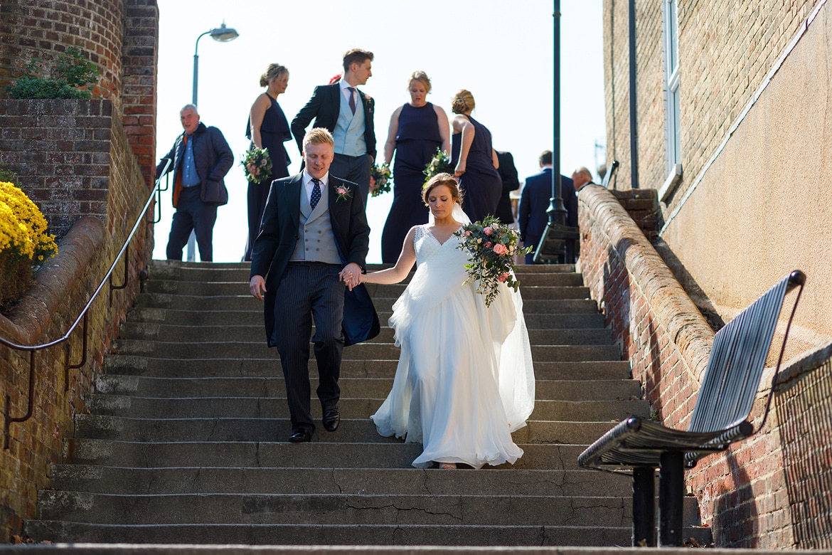 sophie and rory walking down aldeburgh town steps