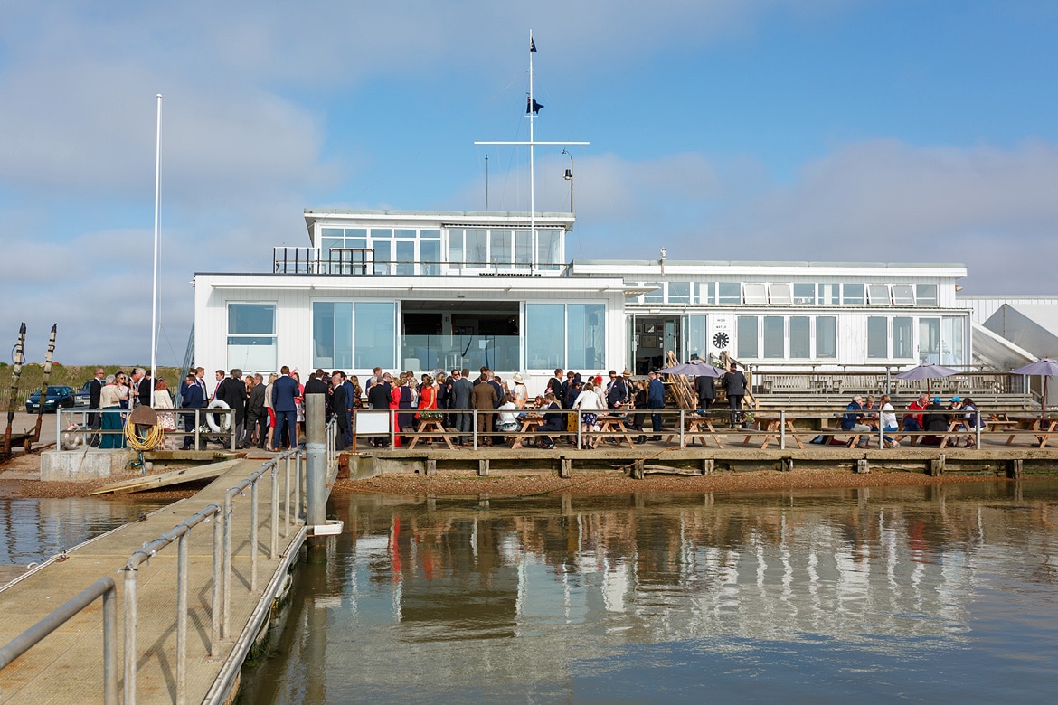 an aldeburgh yacht club wedding seen from the jetty