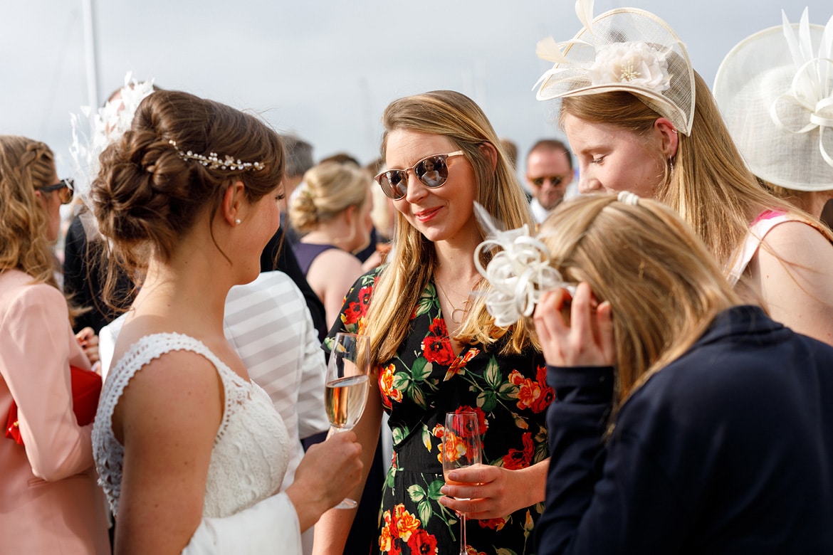 the bride reflected in a guests sunglasses