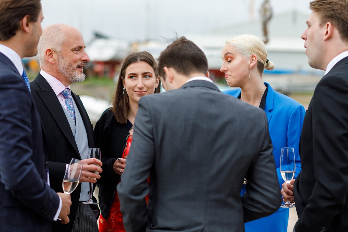 wedding guests chatting