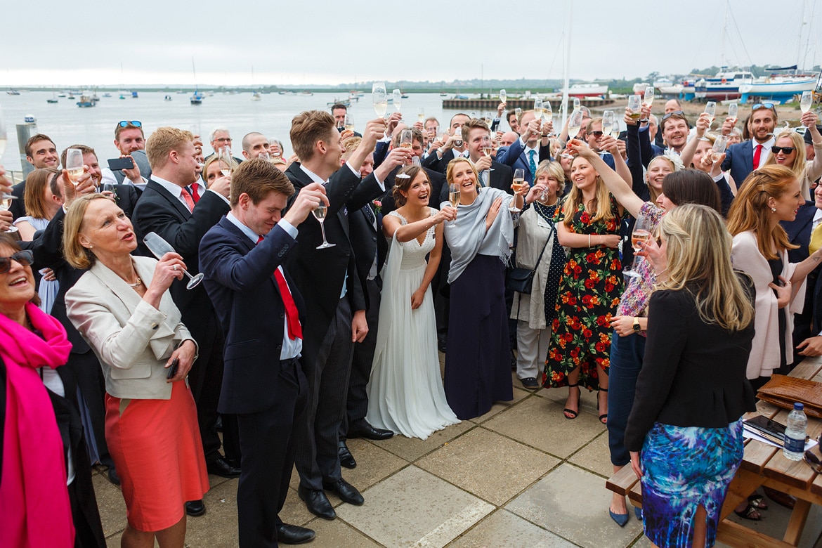 everyone toasts the bride and groom