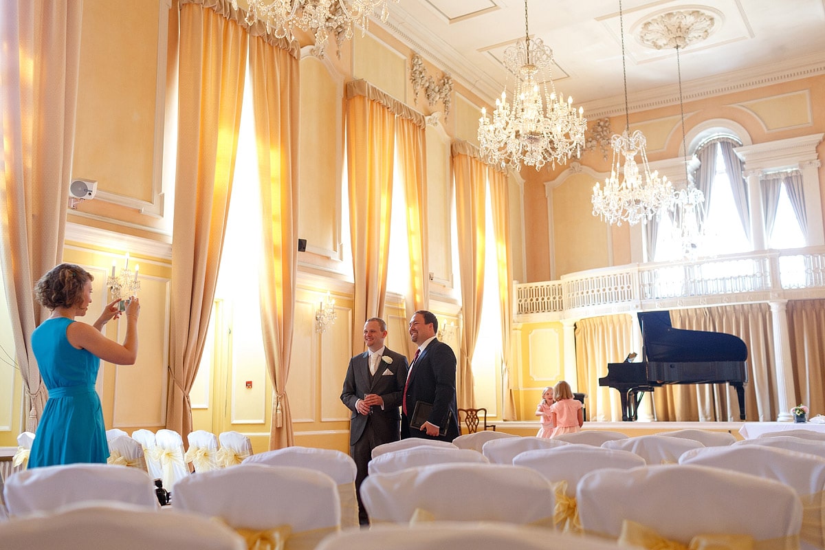 the groom waits in the assembly house music room