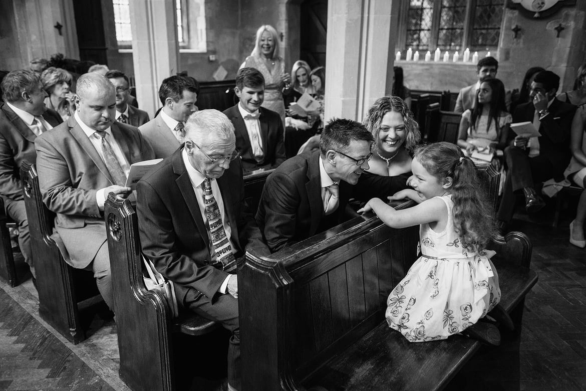 wedding guests waiting in church