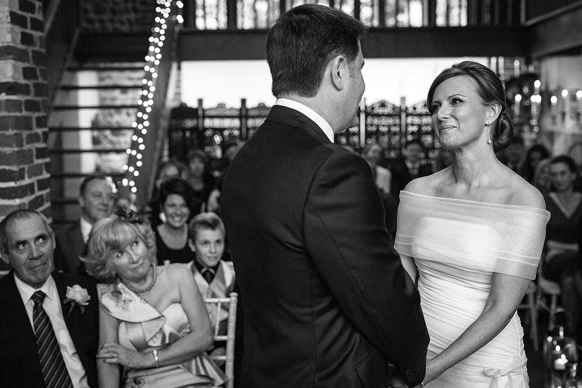 a loving look during a chaucer barn wedding