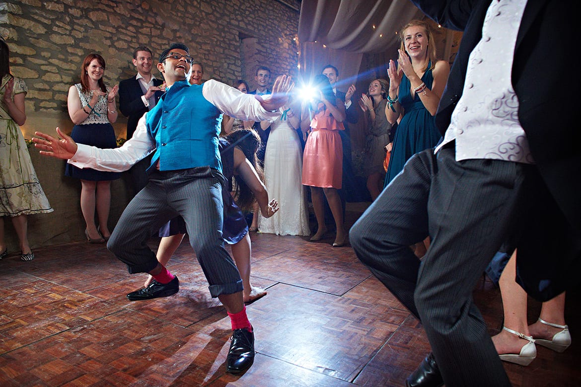 the groom dances with his guests