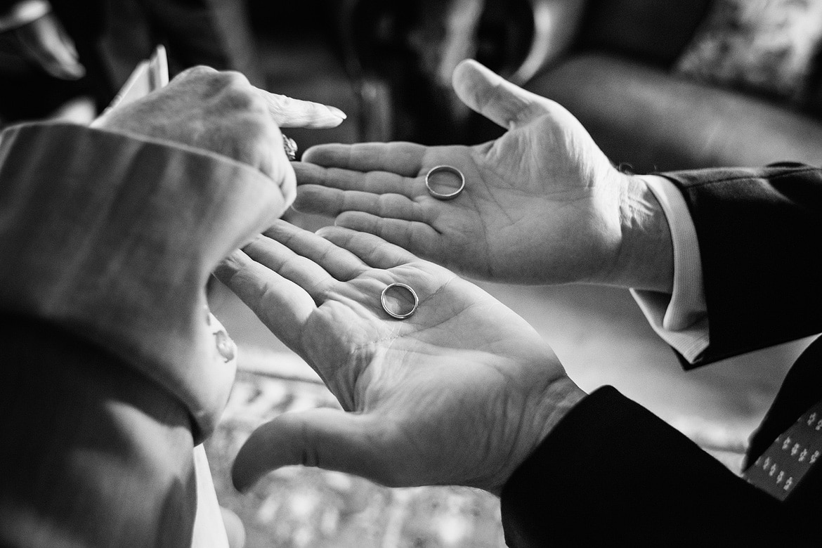 the best man shows the wedding rings