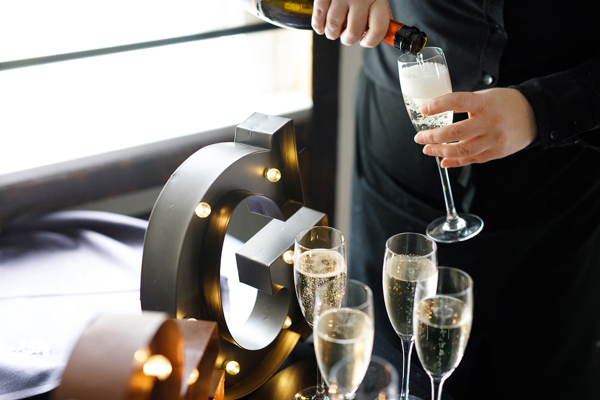 pouring champagne before the speeches